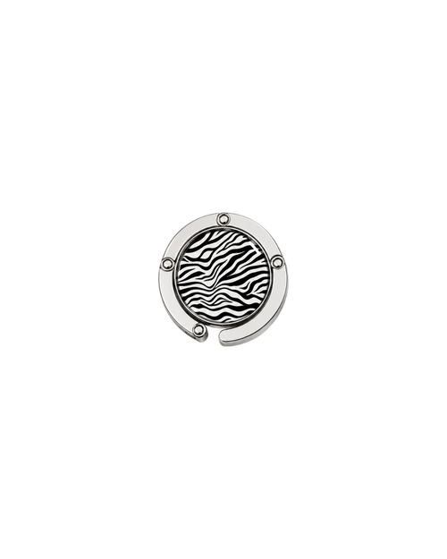 ATORI Main Character Energy circular silver-toned metal handbag hook accessory with a zebra print design, shown on a plain white background.